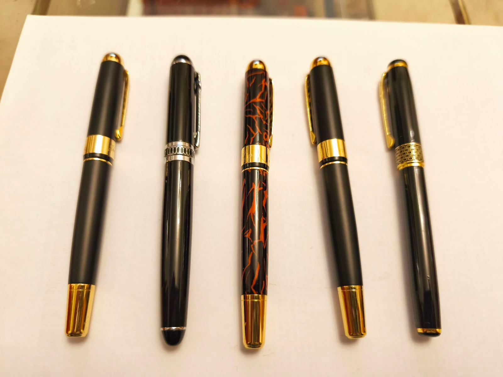 Cinco boligrafos metalicos tinta de gel